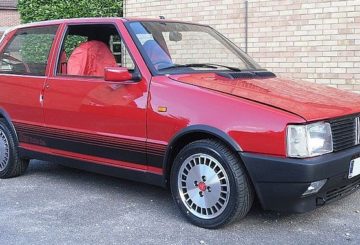 imagem representativa do Fiat Uno 1998 vermelho