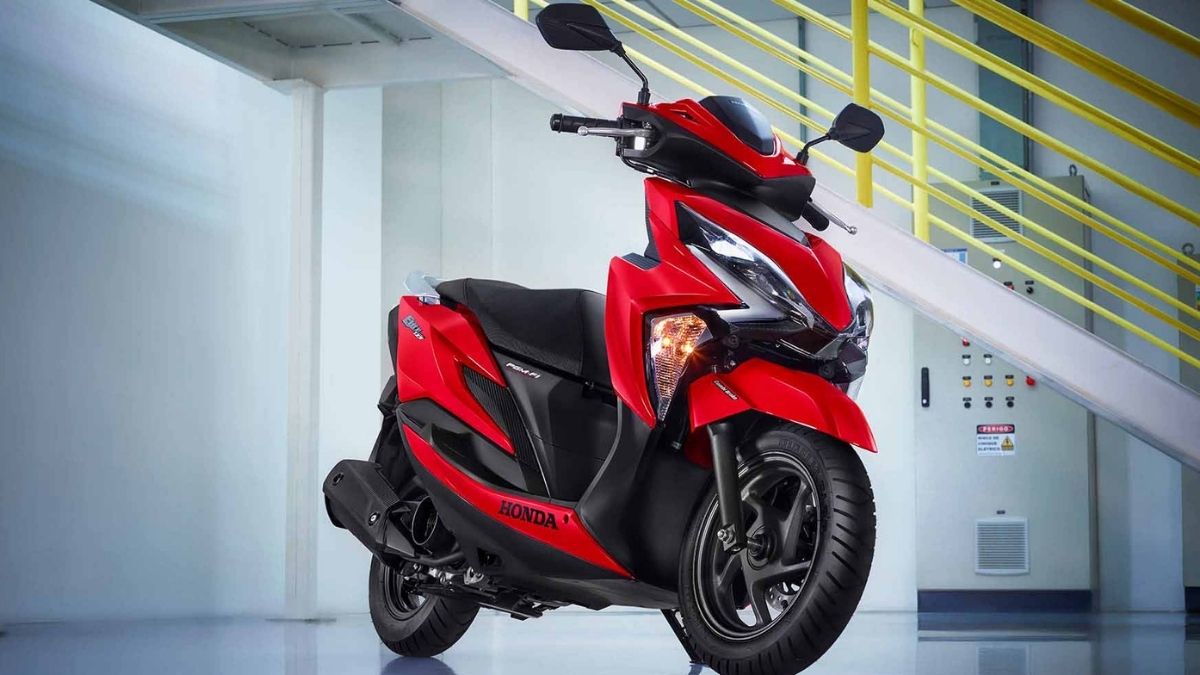 Imagem representativa da moto Honda Elite 125 de cor vermelha. 