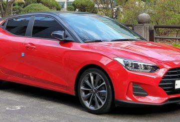 Imagem representativa do Hyundai Veloster G1 na cor vermelha.