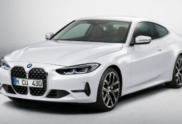 Foto frontal do BMW 430i Coupe 2022, exibindo a nova grade frontal e a lateral do motorista.