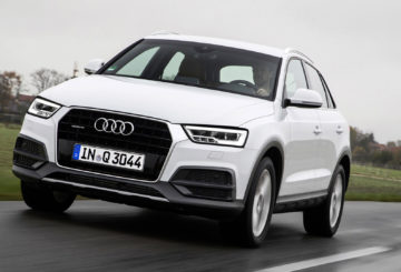 Foto frontal do Audi Q3 Quattro 2017, exibindo toda a dianteira e a lateral do motorista.